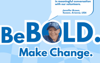 smiling volunteer manager with habitat hat