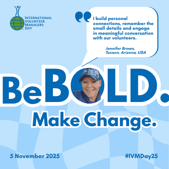 smiling volunteer manager with habitat hat