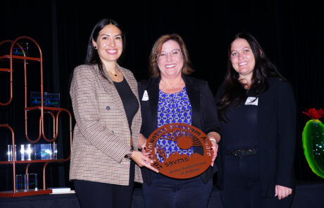 SAVMA Awards 2025 Exceptional Volunteer Program Junior Achievement of Arizona, three smiling honorees accepting award
