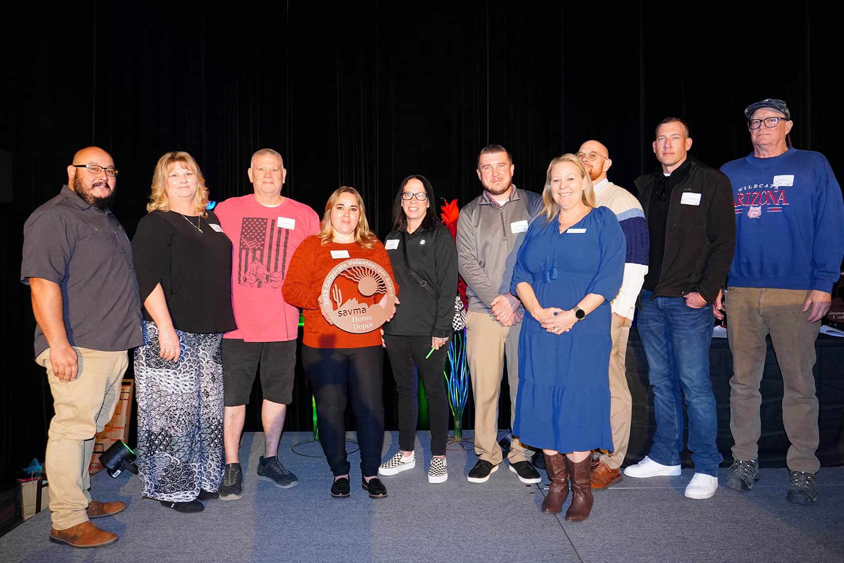 Group of volunteers receiving recognition at the Volunteer Awards 2026 event.